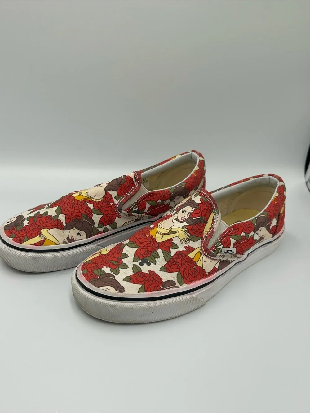 Vans Disney Cream Slip-On Sneakers with Belle and Red Rose Print